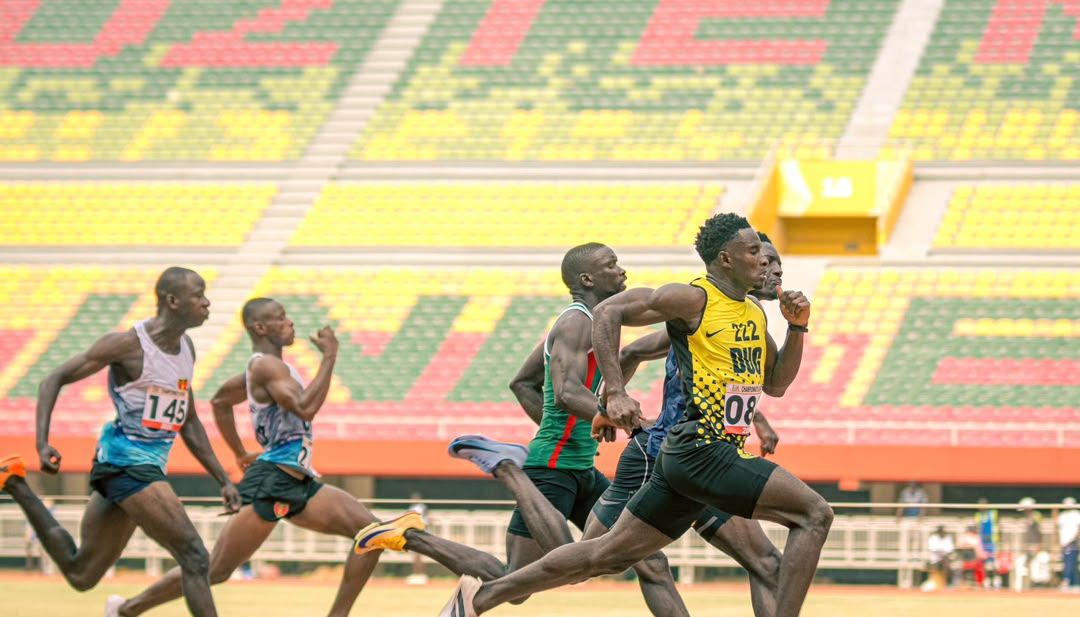 Sprinters racing on a stadium track