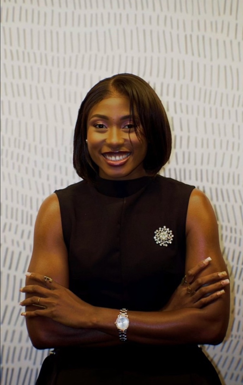 Star Mpama, founder of Paragon, smiling with arms crossed